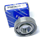 Abdul Traders AS 20 heavy duty one-way clutch bearing with metallic finish in front of its blue and white product box.