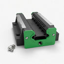 Abdul Traders GHW 45 HC linear guide block, black with green end caps, for heavy-duty CNC and automation systems.