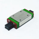 Abdul Traders WERB MGN 7H miniature linear guide block for 7mm rails with green and red accents on a white background