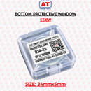 Abdul Traders AT protective window D34xT5 for 15KW fiber laser cutting heads in a clear plastic storage case.