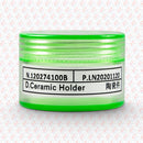 Abdul Traders Raytools ceramic body D32xM14 laser cutting machine component in a green plastic storage container