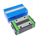 Abdul Traders SHAC GEH 15 CA long compact linear guide block with green end seals and metal casing.