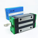 Abdul Traders SHAC GHH 20 CA linear guide block, black and green, for 20mm rails, with steel ball bearing and lubrication fitting.