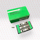 Abdul Traders WERB HGH 15CA linear guide block, standard load carriage for 15mm rail, green accents.
